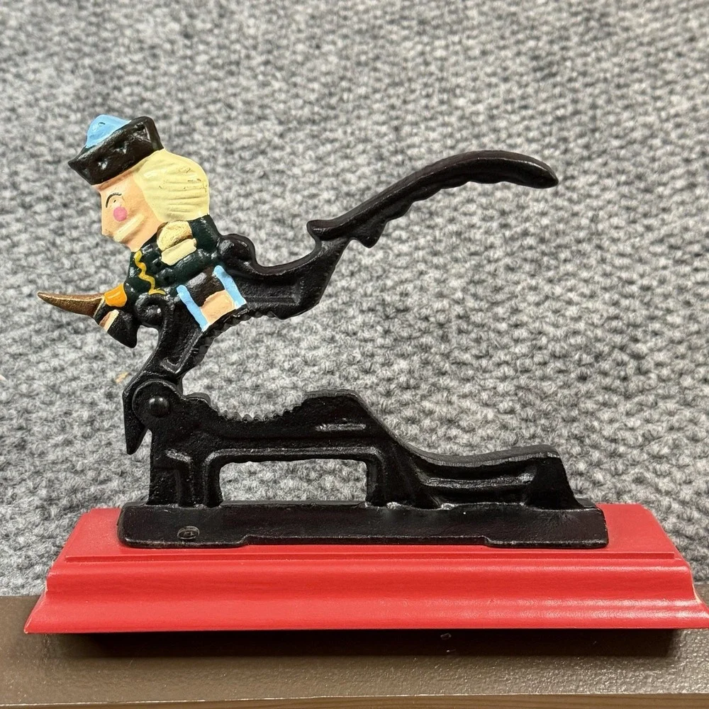 Vintage Cast Iron Soldier Nutcracker Mounted On Red Wooden Base Nut Cracker